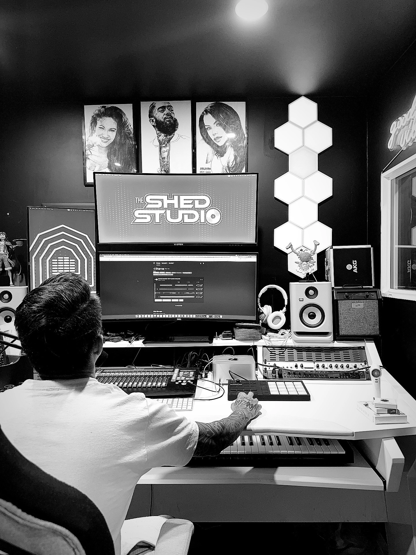 Hau at work in The Shed Studio, mixing at his desk