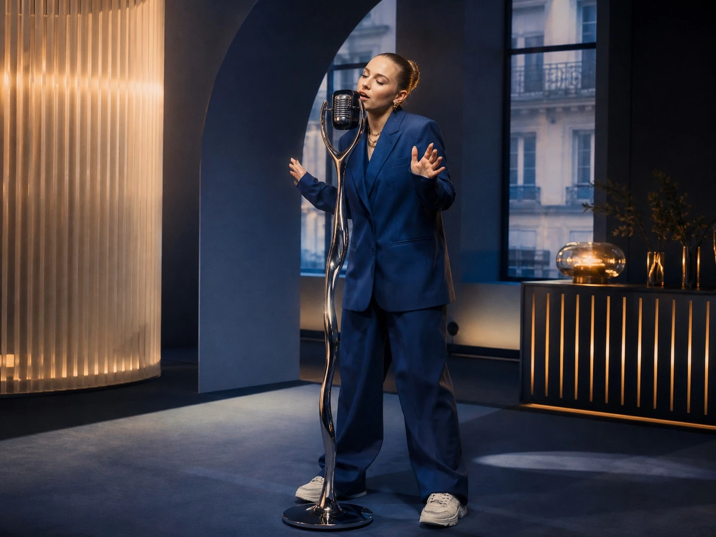 European woman vocalist performing in a modern Paris studio